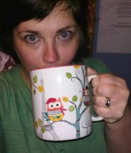 No make-up, messy hair, bad angle, giant coffee cup...